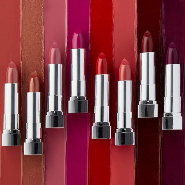 maybelline rouge a levres color sensational 1 – BEAUTÉNIUM BeautÉnium Row of Colorful Lipsticks with Silver Cases in Varying Reds Pinks and Purples Against Matching Lipstick Tubes