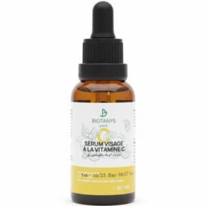 Brown glass dropper bottle of Biotanys Vitamin C Face Serum, 30 ml, with label showing citrus illustrations on the front.